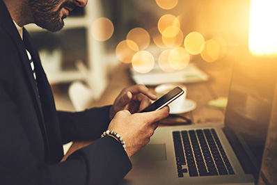 March Article Monthly Image - Picture of a man using a cell phone